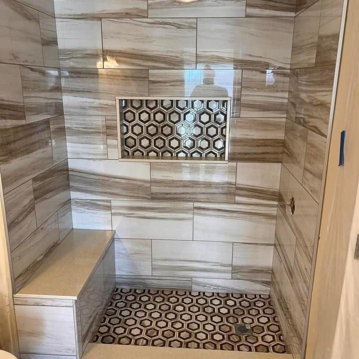 Custom marble shower with hexagon mosaic feature wall